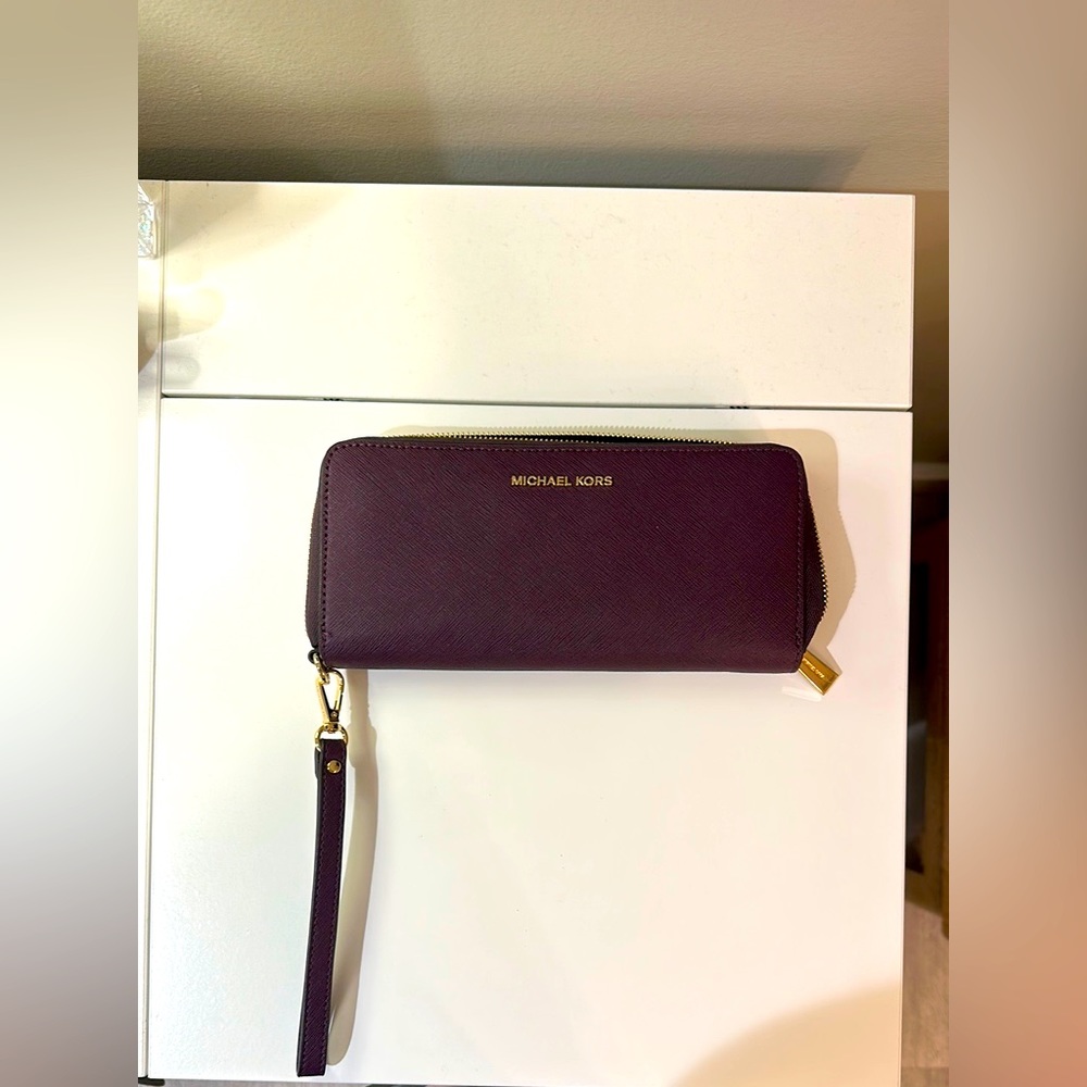 Michael Kors Purple wristlet/wallet.